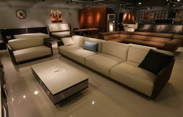 Beige three-seat sofa.